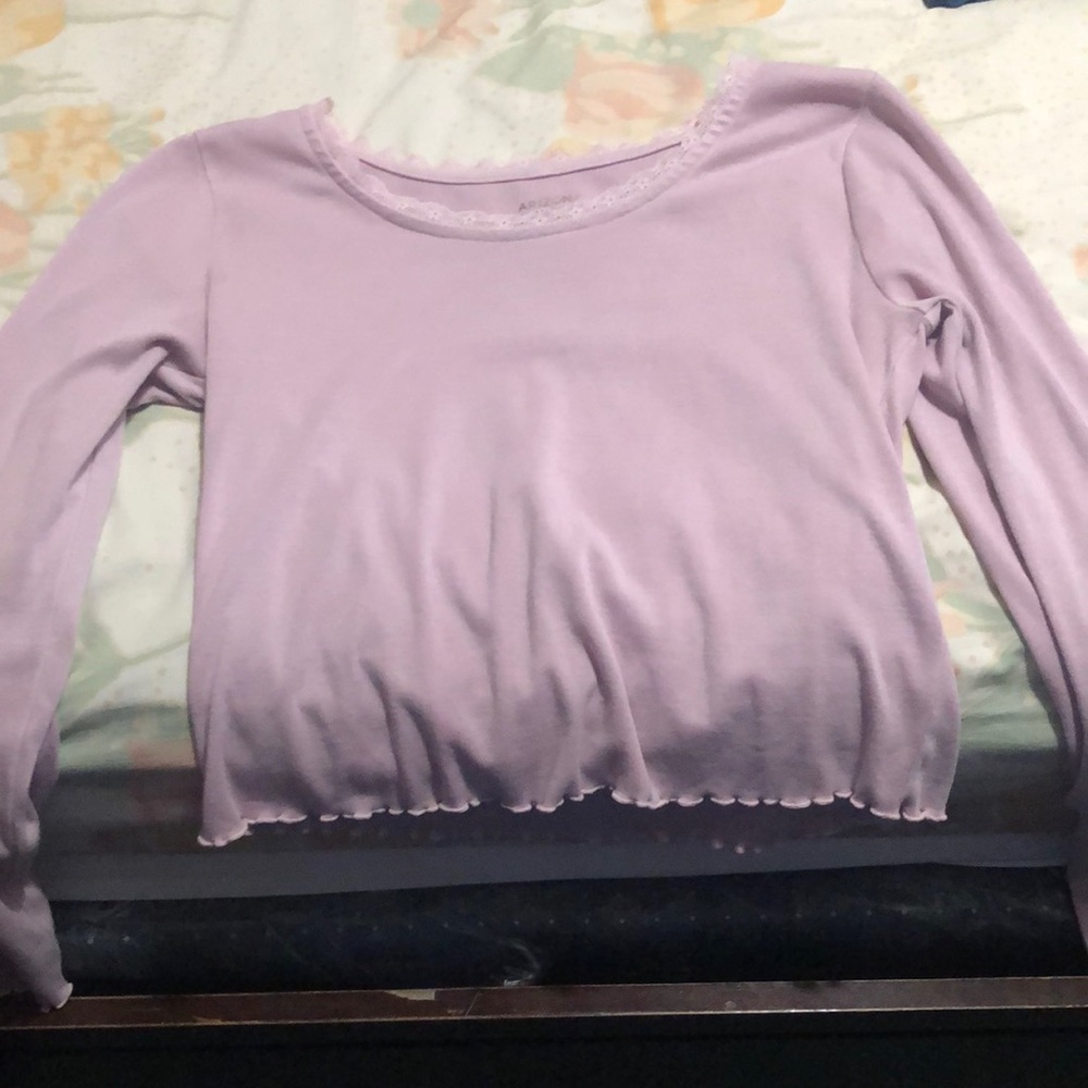 A pink long sleeve shirt